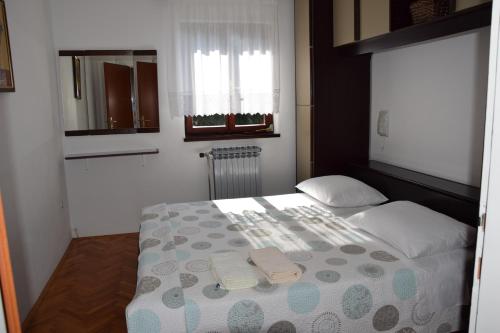 Postel nebo postele na pokoji v ubytování Apartment Marija with terrace