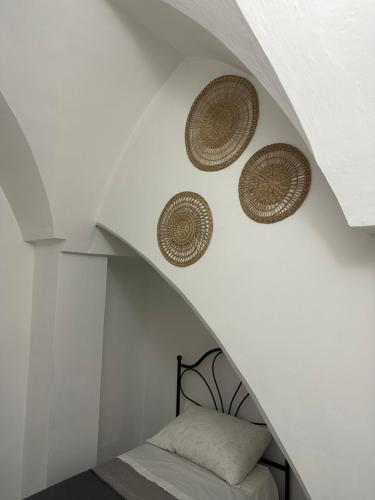Postel nebo postele na pokoji v ubytování Terra D`Itria