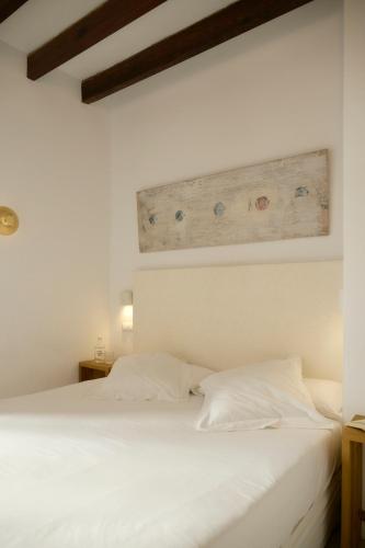Postel nebo postele na pokoji v ubytování Hotel Forn Nou