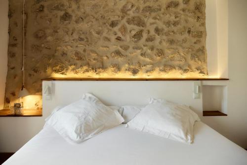 Postel nebo postele na pokoji v ubytování Hotel Forn Nou
