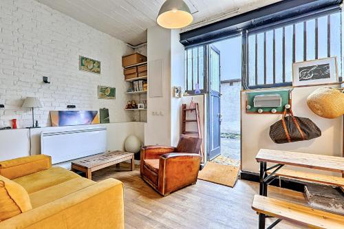 Posezení v ubytování Atelier Bleu Charmant petit Loft