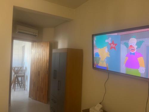 Μια τηλεόραση ή/και κέντρο ψυχαγωγίας στο Apartamento um quarto
