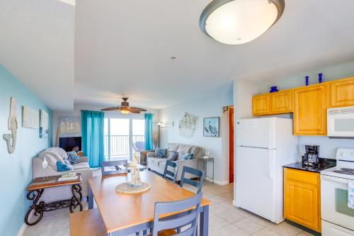 a kitchen and a dining room with a table and a kitchen and a kitchen at Cozy Middle Bass Island Getaway On Lake Eerie! in Put-in-Bay