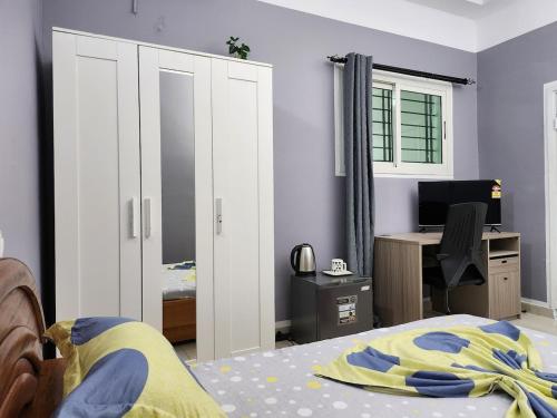 En eller flere senge i et værelse på Bed, TV & Breakfast