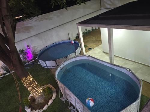 Kolam renang di atau dekat dengan House with garden and pool