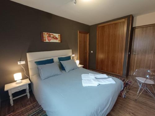 Ένα ή περισσότερα κρεβάτια σε δωμάτιο στο InmoCyma Mincholet bajo con terraza