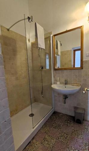 a bathroom with a shower and a sink at La Dimora Di Anna in Chiusi