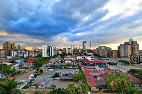 a cityscape of a city with tall buildings at Holiday Inn - Harare by IHG in Harare