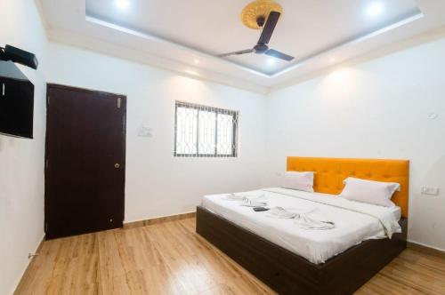 Katil atau katil-katil dalam bilik di Hotel Rohit Holiday Homes
