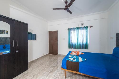 Katil atau katil-katil dalam bilik di Hotel Rohit Holiday Homes