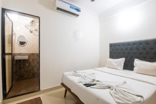 Katil atau katil-katil dalam bilik di Hotel Rohit Holiday Homes