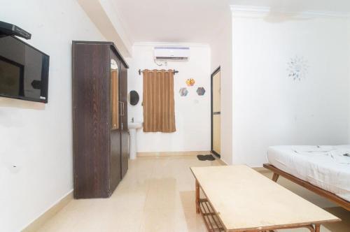 Katil atau katil-katil dalam bilik di Hotel Rohit Holiday Homes