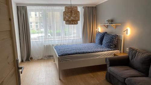 Ένα ή περισσότερα κρεβάτια σε δωμάτιο στο Apartament Juliana