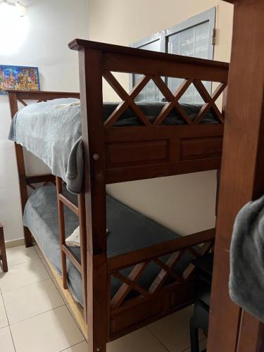 a bunk bed in a room with a bunk bed in a room at Departamento 1 interno - centro - Inst Cardiologico - cochera in Corrientes
