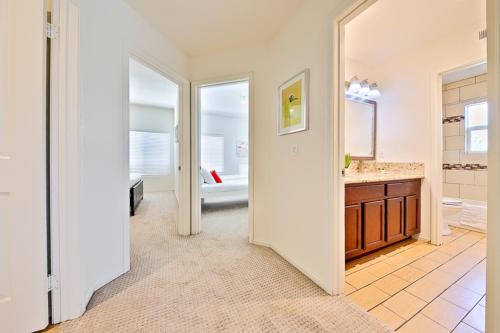 a large bathroom with a sink and a tub at F-56 Winnie the Poohs Treehouse in Anaheim