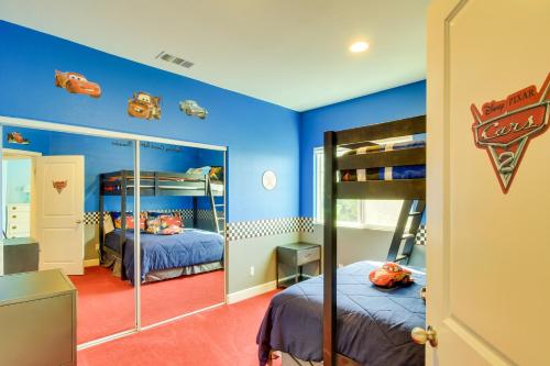 a room with two bunk beds and a mirror at F-33 Walts Place in Anaheim