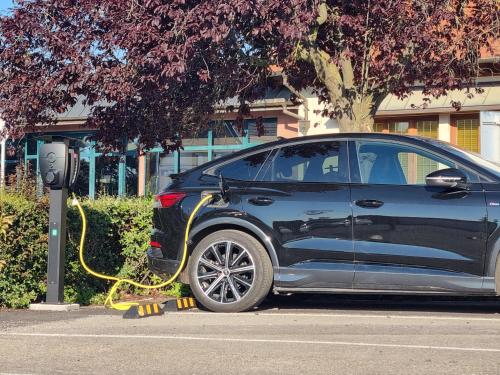 a car is hooked up to a parking meter at Hotel L'Europe in Colmar