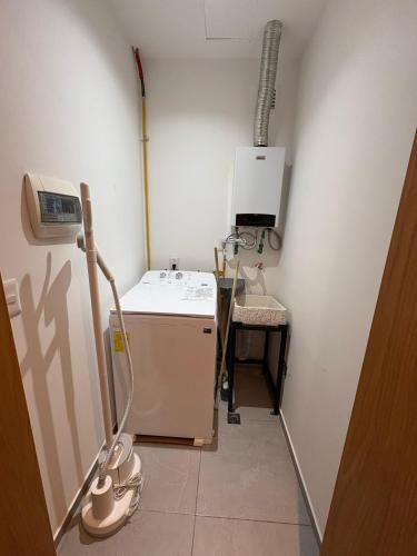 a small kitchen with a sink and a stove at Londres #187 in Mexico City