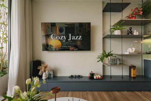 a living room with a black counter with plants at -20 Off I Beloving Home I 3BR Lakeview I Onsen I Golf View in Cong Luận