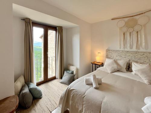 Postel nebo postele na pokoji v ubytování O' Stiavucco B&B