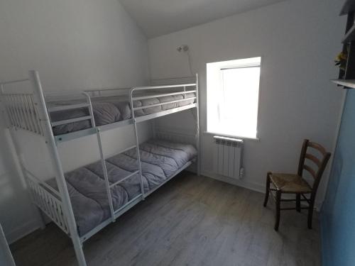 Postel nebo postele na pokoji v ubytování Petite maison de pêcheur en bord de mer