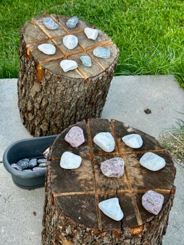 a couple of logs with rocks on them at XYZ eXtreme You Zen in Szczyrk