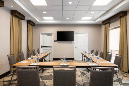 a conference room with a long table and chairs at Residence Inn by Marriott Des Moines Downtown in Des Moines