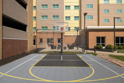 a basketball court in front of a building at Residence Inn by Marriott Des Moines Downtown in Des Moines