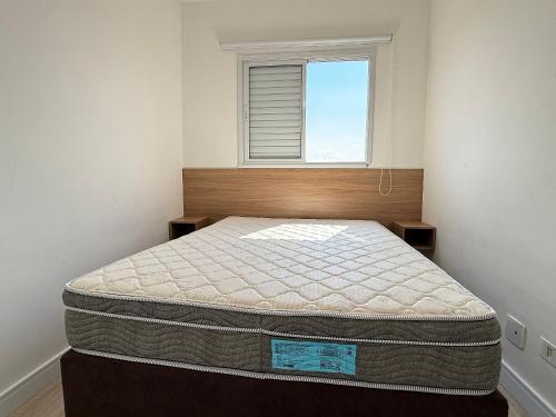 Postel nebo postele na pokoji v ubytování Apê Tupi c/ Wi-Fi e vaga a 600m da praia!