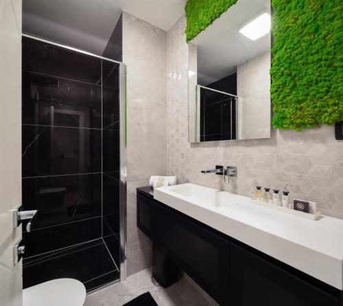 Ένα μπάνιο στο Luxury Apartment Sunray