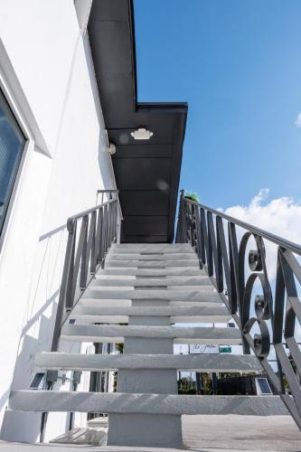 a staircase leading up to the top of a building at The Jaxon in West Palm Beach