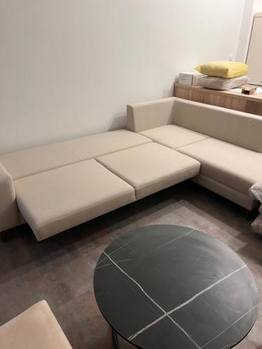 Un lugar para sentarse en Pearl Bee Deluxe Suites