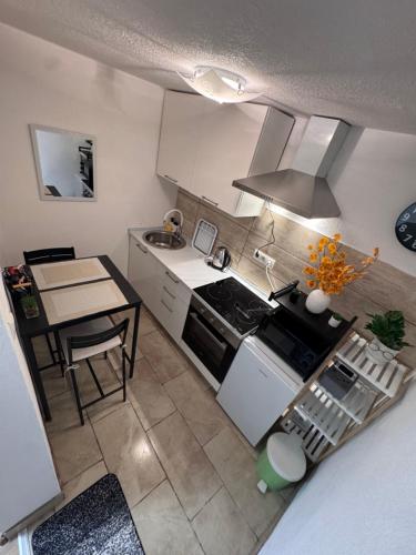 Kuchyň nebo kuchyňský kout v ubytování Apartman Josip
