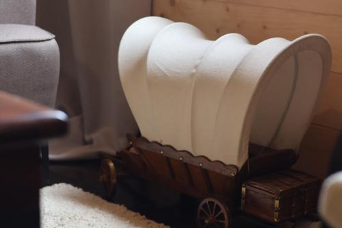 a wooden toy car with a roll of toilet paper at Portes du Soleil - Zabljak in Žabljak