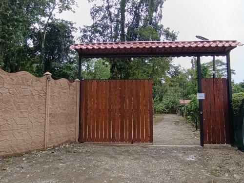 an entrance to a gate with a fence at Villas Kiki in Puerto Viejo