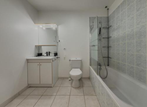 a bathroom with a toilet and a sink and a shower at Nouveauté, maison avec piscine in Collobrières