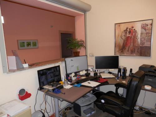 an office with a desk with two computers on it at Relax Hotel-Ludwigshafen in Ludwigshafen am Rhein