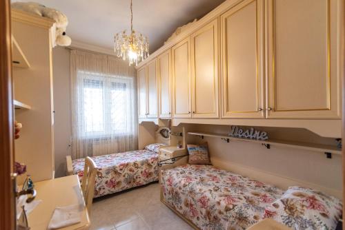 Ένα ή περισσότερα κρεβάτια σε δωμάτιο στο Dimora Dei Desideri