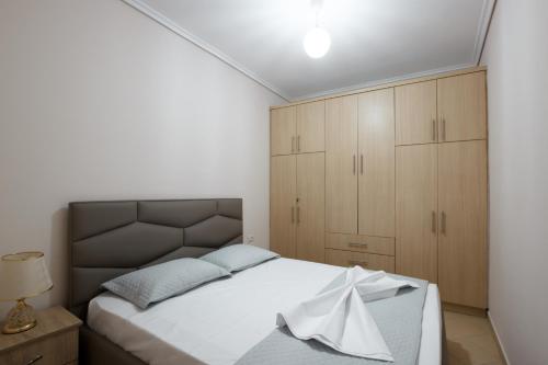 Postel nebo postele na pokoji v ubytování Ariadne 7 Apartments