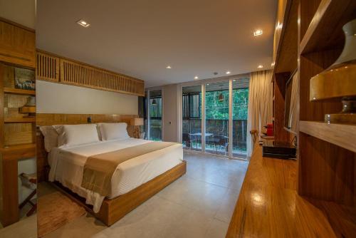 Katil atau katil-katil dalam bilik di Hotel Spa Nau Royal