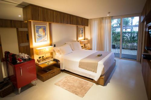 Katil atau katil-katil dalam bilik di Hotel Spa Nau Royal
