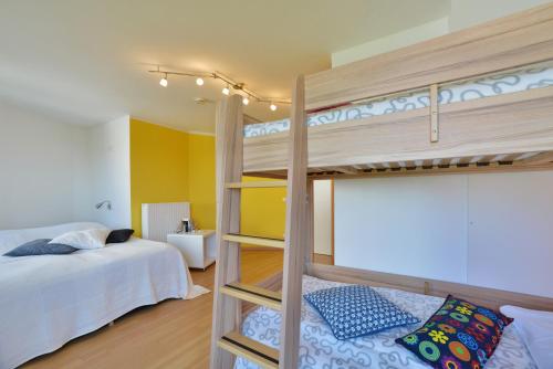 Postel nebo postele na pokoji v ubytování Ferienhaus Leuchtturm