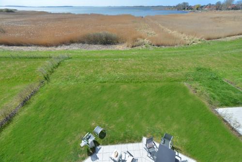 an aerial view of a large grassy field with tables at Ferienhaus Leuchtturm in Breege
