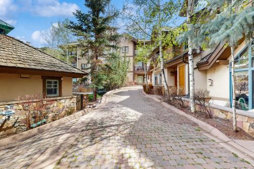 a cobblestone street in front of a house at Arrowhead Escape in Edwards