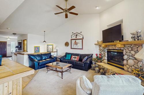 a living room with a couch and a fireplace at Lookout Ridge 63 in Dillon