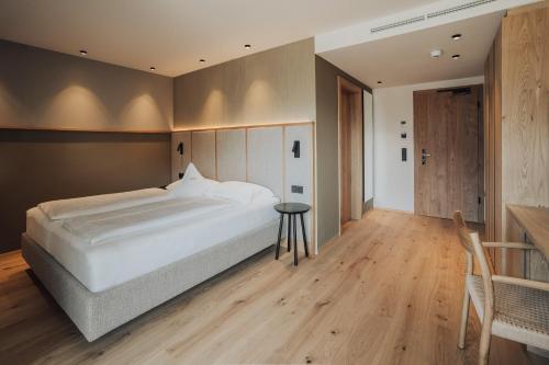 Postel nebo postele na pokoji v ubytování Hotel Lisetta