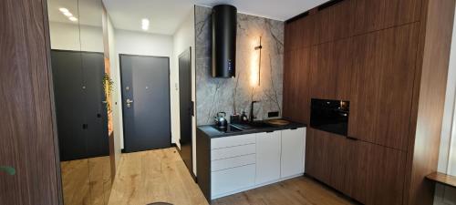Η κουζίνα ή μικρή κουζίνα στο RCS Apartment Czysta 123