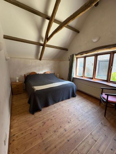 En eller flere senge i et værelse på Coppingers Cottage, Galsham Farm