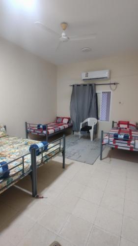 Postel nebo postele na pokoji v ubytování Gulf Gateway Hostel