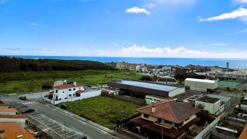 an aerial view of a city with the ocean at Amorosa Beach Apartment Sea View in Viana do Castelo